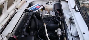 VAZ (LADA): LADA 2107 – ağ rəngli sedan Xüsusiyyətlər: - Korpus: 4 qapılı sedan — 7