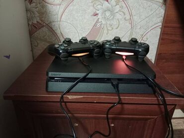 PS4 (Sony Playstation 4): Playstation 4 slim 1TB Ideal veziyyetdedir Hec bir problemi yoxdu