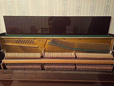 simli ped: Upright pianino – “Kouhssuu” (klaviatura üzərində yazı). - Korpus — 5