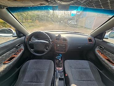 полировка для авто: Daewoo Nubira: 1997 г., 1.8 л, Механика, Бензин, Седан — 7