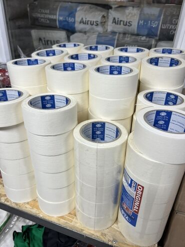 Ножи: Малярная лента YLD TAPE, представленная в рулонах белого цвета