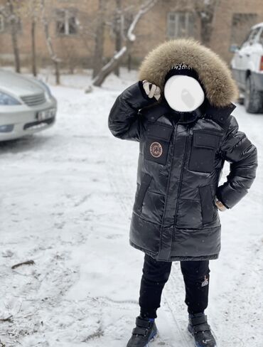 детские длинные пуховики: Зимняя стильная куртка пуховик Корея, опушка натуралка-енот . Рост 134