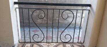 islenmis demir darvaza: Balkon məhəccəri, Dəmir, Ünvandan götürmə