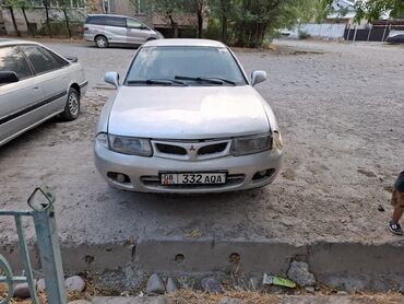 зарядка на авто: Mitsubishi Carisma: 1998 г., 1.8 л, Механика, Бензин, Седан