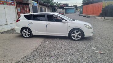 тайота филдер: Белый универсал Toyota Caldina, оснащенный литыми дисками и рейлингами
