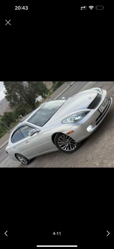 стоп фары нексия: Элегантный седан Lexus ES 300 серебристого цвета, представленный на