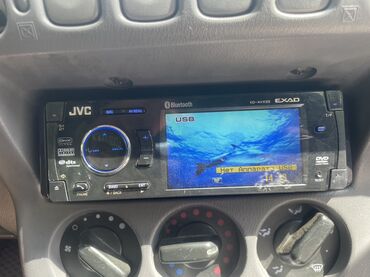 видео магнитола: Автомобильная мультимедийная магнитола JVC EXAD KD-AVX33 ( Оригинал)