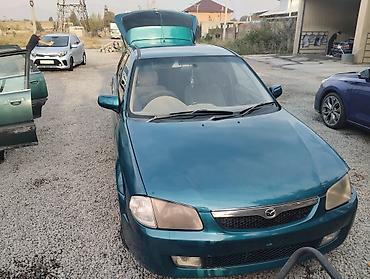 Mazda: Mazda Familia: 2000 г., 1.5 л, Автомат, Бензин, Хэтчбэк — 4