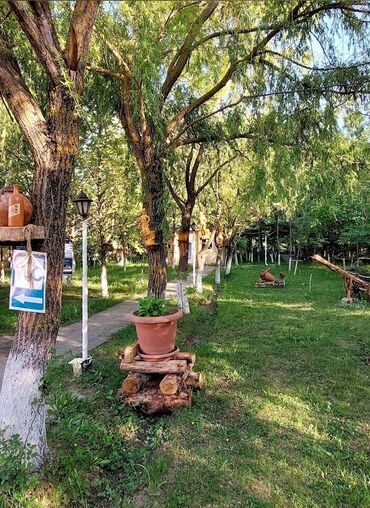 Kommersiya daşınmaz əmlakının satışı: Qusar şəhərində(200 sot) Şahdağa gedən yolun Qusar çayının sol — 15