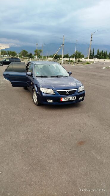 балыкчы автомобиль: Mazda 323: 2001 г., 1.6 л, Механика, Бензин, Хэтчбэк
