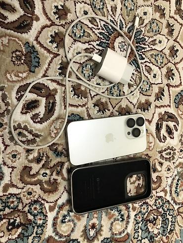 IPhone 15 Pro, 128 ГБ, цвет светлый (Natural Titanium/White). На iOS