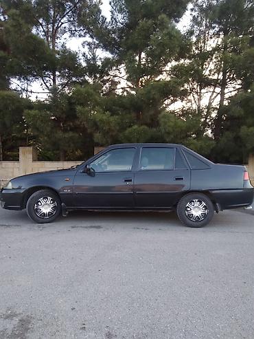 09 maşın: Daewoo Nexia: 1.5 l | 2010 il Sedan — 4