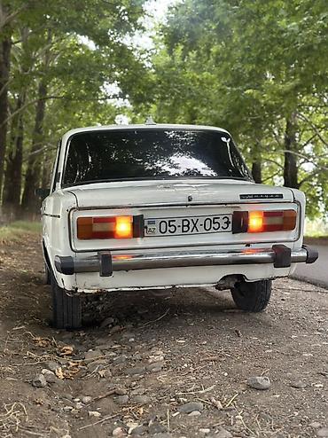 yan güzgülər s: VAZ 2106 sedan – klassik sovet modeli, ağ rəng. Karopka 4 işləy — 3