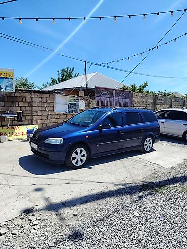 chevrolet cruze hatchback: Opel Astra: 1.6 l | 1998 il 500000 km Universal — 4