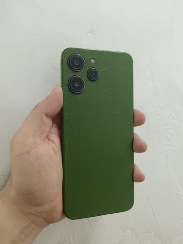 xiomi 12 x: Xiaomi Redmi 12, 128 GB, rəng - Qara, 
 Zəmanət, Barmaq izi, İki sim kartlı