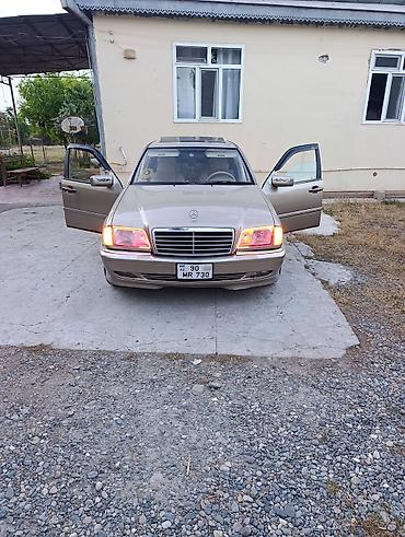tap az 07: Mercedes-Benz C‑Class W202 sedan - Korpus: qızılı rəng, 4 qapı — 6