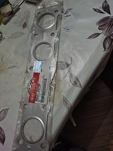 kia starter: KIA orijinal ehtiyat hissələri – silindr başlığı və egzoz kollektor — 1
