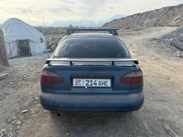 капот на мазда демио: Daewoo Lanos: 1996 г., 1.5 л, Механика, Бензин, Седан