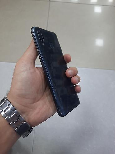samsung a30 kabro: Samsung Galaxy A30, 64 GB, rəng - Qara, Barmaq izi — 6