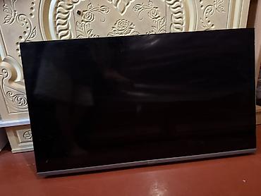 skyworth 43: Телевизор Skyworth, диагональ ориентировочно 43–50". Тонкие рамки — 1