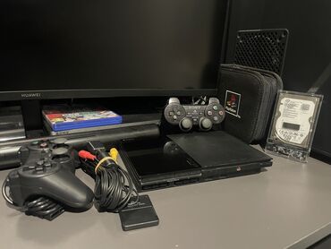 сколько стоит playstation 2: Playstation 2 Slim 500GB İdeal vəziyyətdə, ən son reviziya cihazdı