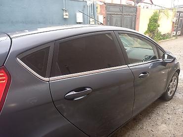 tap.az lada: Ford Fiesta hatchback — tünd boz rəng, 5 qapı. Xüsusiyyətlər: - — 1