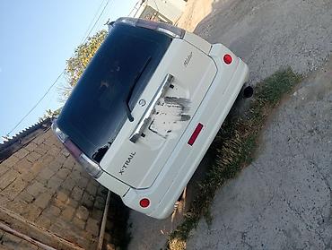volkswagen автомат: Nissan X-Trail “Rider” paket, ağ rəngli SUV Xüsusiyyətlər: - Korpus — 1