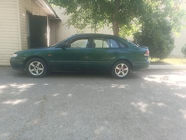 a8 d2: Mazda 626: 1997 г., 2 л, Механика, Бензин, Седан — 6