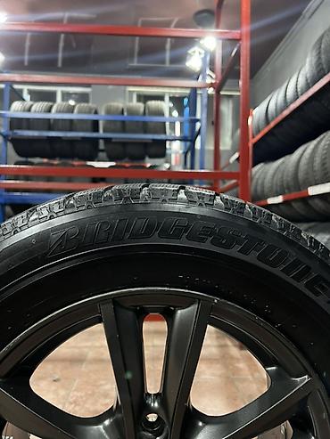 Транспорт: Комплект колес в сборе на литых дисках. - Шины: Bridgestone Studless — 8