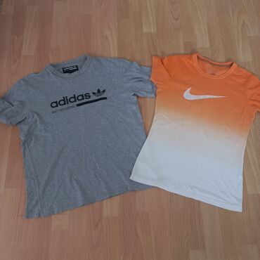adidas siroka trenerka: Kratak rukav, 158-164 na lalafo.rs adidas siroka trenerka: Kratak rukav, 158-164