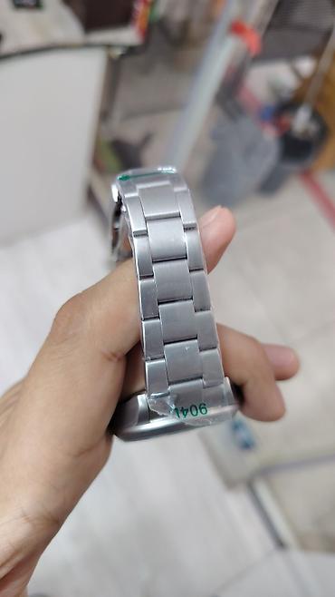 oyster saat: Saat: Kvars mexanizmi olan analoq qol saatı Model yazısı: “ROLEX — 2