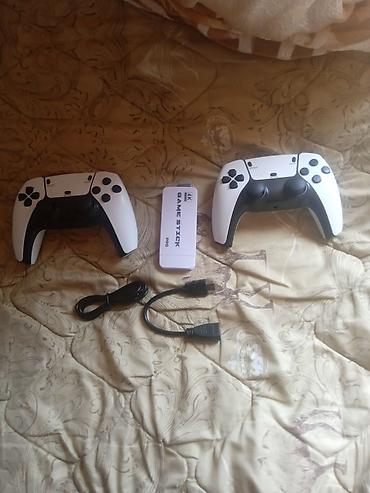 сколько стоит приставка 5: Игровой комплект Game Stick Pro 4K Состав набора: - ТВ-приставка Game — 1