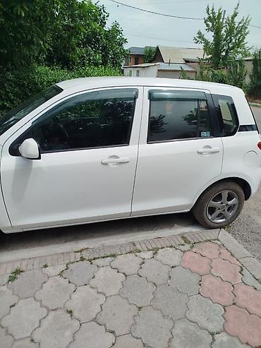 bid e5: Mazda 2: 2006 г. — 4