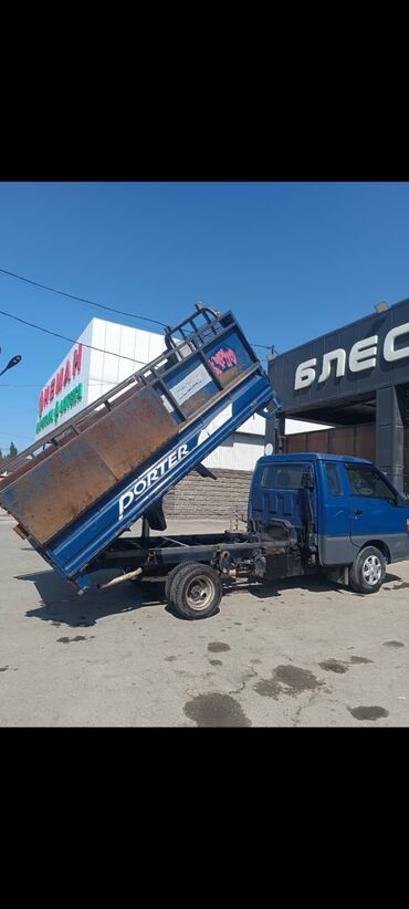 хуйундай портер: Грузовой автомобиль Hyundai Porter с откидным кузовом синего цвета
