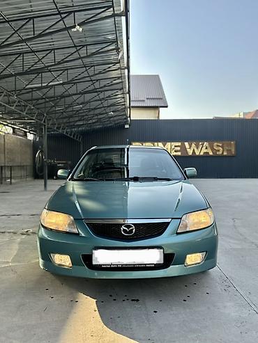 50 55: Mazda 323: 2001 г., 1.6 л, Автомат, Бензин, Хэтчбэк — 1