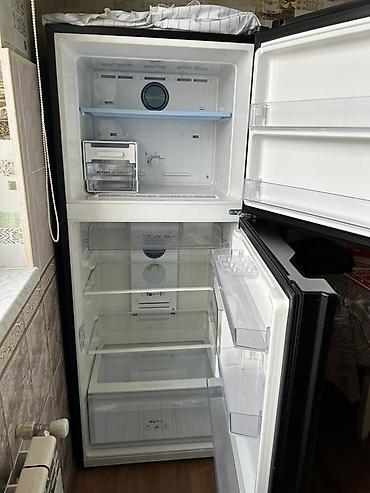 iki: İşlənmiş 2 qapılı Samsung Soyuducu Satılır, rəng - Qara, Təkərli — 2