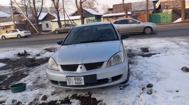 Mitsubishi: Mitsubishi Lancer: 2005 г., 1.3 л, Механика, Бензин, Седан