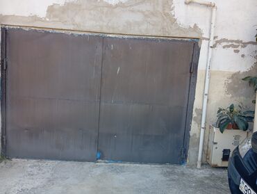 demir seyf qapilar: Metal qaraj qapısı - Material: qalın metal təbəqədən hazırlanmış, iki