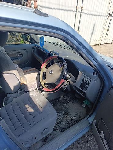 chek it: Mazda Demio: 2001 г., Автомат, Бензин, Хэтчбэк — 5