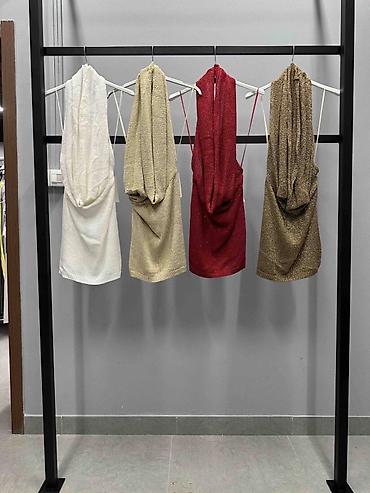 mini torbice: Ženska mini haljina sa dubokim drape dekolteom
2500
Din
S M L — 5