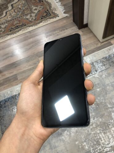 телефон fly 2040i: Xiaomi Redmi Note 8 Pro, 64 ГБ, цвет - Белый, 
 Отпечаток пальца, Две SIM карты, Face ID