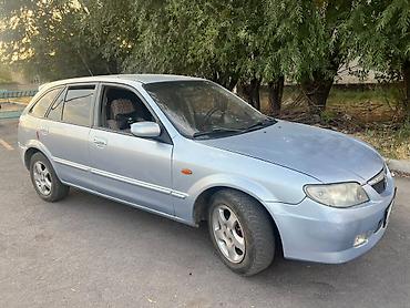 byd bot 384: Mazda 323: 2001 г., 1.6 л, Механика, Бензин, Универсал — 2