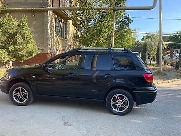 mitsubishi pikap: Mitsubishi Outlander, qara rəng, 5 qapılı krossover/SUV — 9
