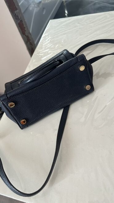 Çantalar: Əl çantası, Michael Kors