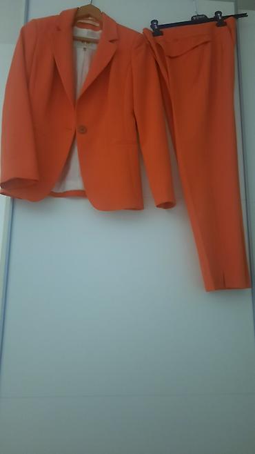 Kompleti: Ženski komplet – sako i pantalone u jarko narandžastoj boji. - Sako — 5