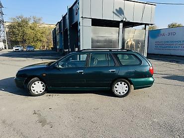 mazda 323 2003: Nissan Primera: 2001 г., 1.8 л, Механика, Бензин, Универсал — 2