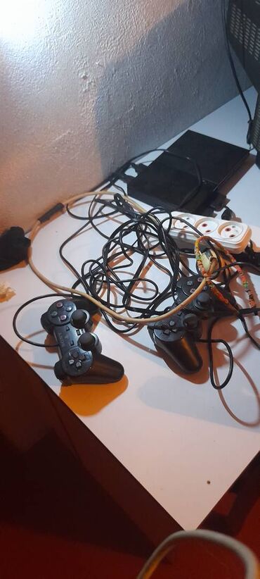 PS2 & PS1 (Sony PlayStation 2 & 1): PS2 satiram ela veziyetde.2 dene disk verirem usdunde.2 eded pultu ve