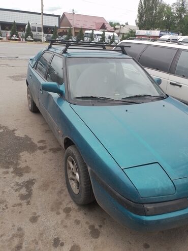 мазда 1992: Mazda 323: 1992 г., 1.6 л, Механика, Бензин, Хэтчбэк