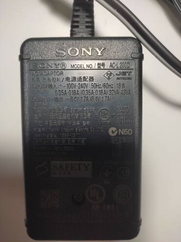петличные микрофоны: Блок питания для видеокамер Sony AC -L200D, Напряжение 8.4В, Сила тока
