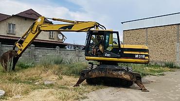 гусиничный экскаватор: Экскаватор, Caterpillar, Колесный — 5